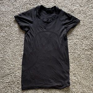 Black Lululemon swiftly tech tshirt. Hip length